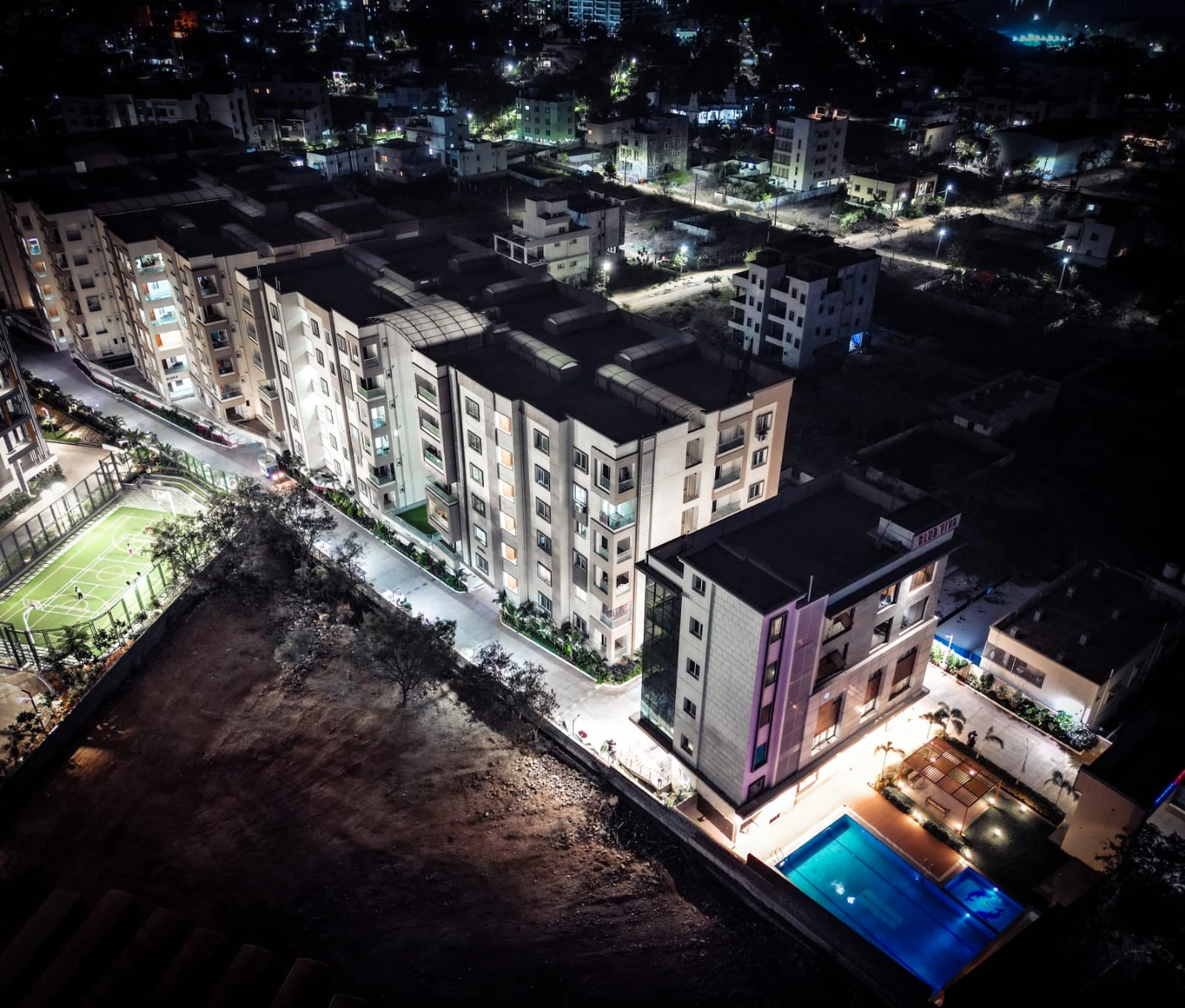 Sterling Abode night aerial view with pool